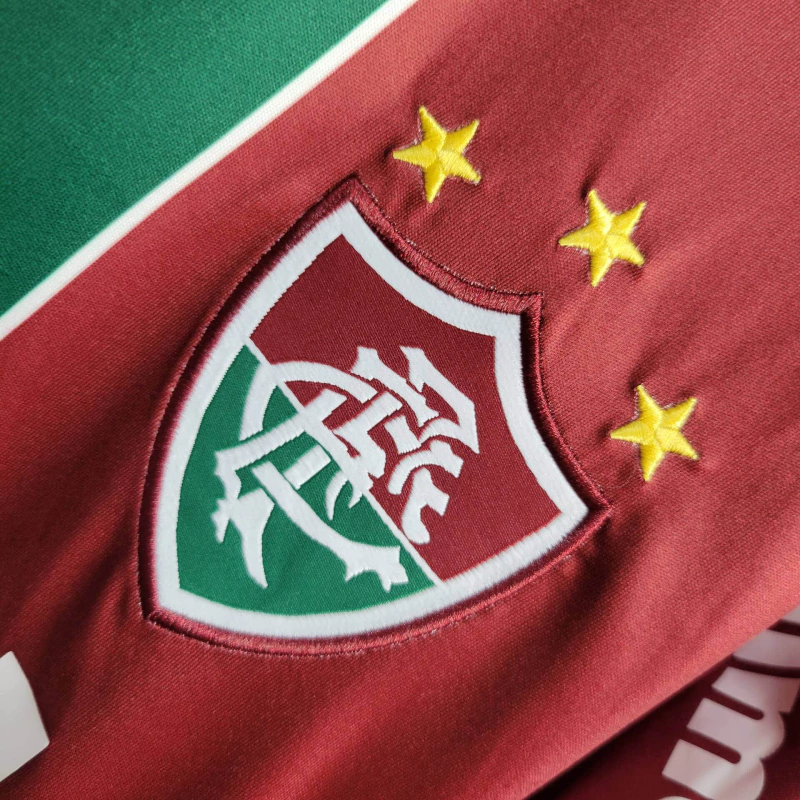 Camisa Retrô Fluminense I 2010 – Masculina – Vermelha com detalhes em branco simbolo