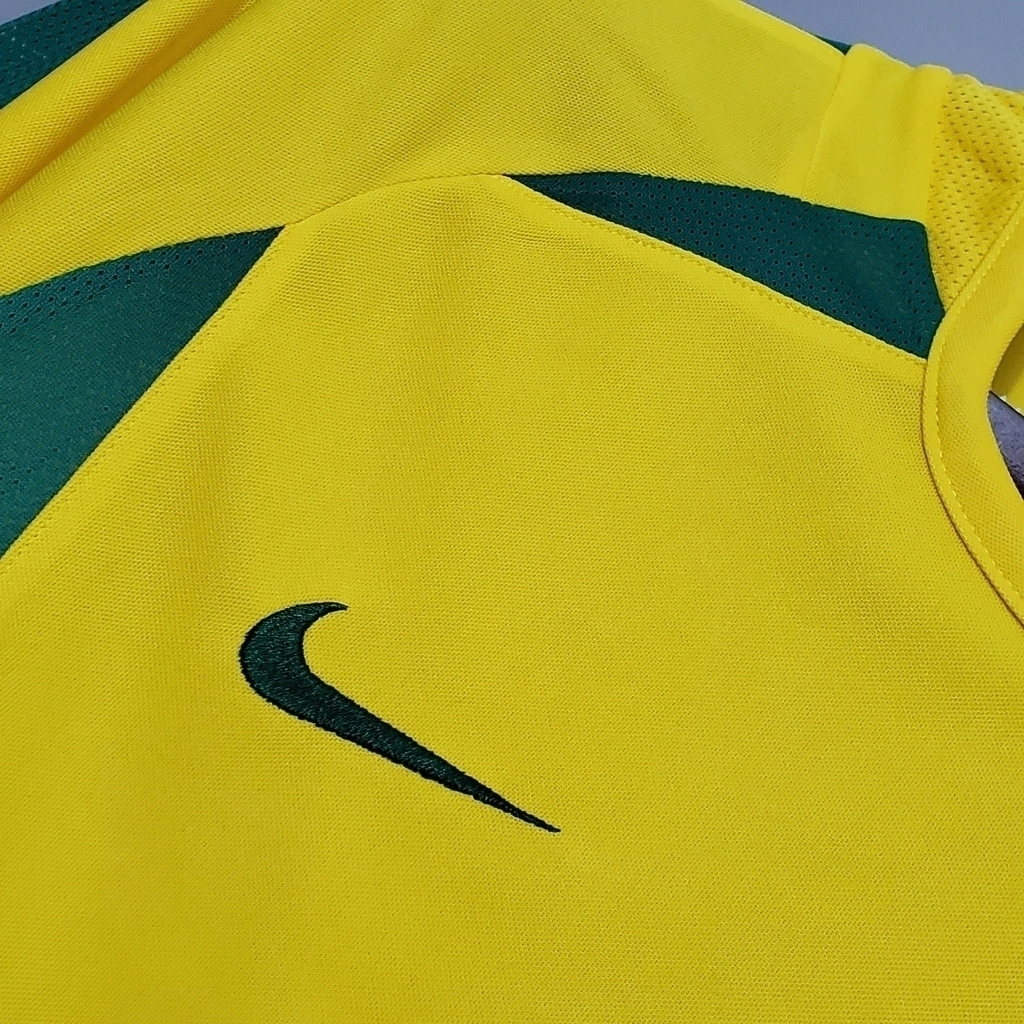camisa-retro-2002-selecao-brasileira-i-nike-masculina-amarela-71-1e2e8237cbe00f191516504813175789-1024-1024-7c0083eb31393baf8716959972026299-1024-1024