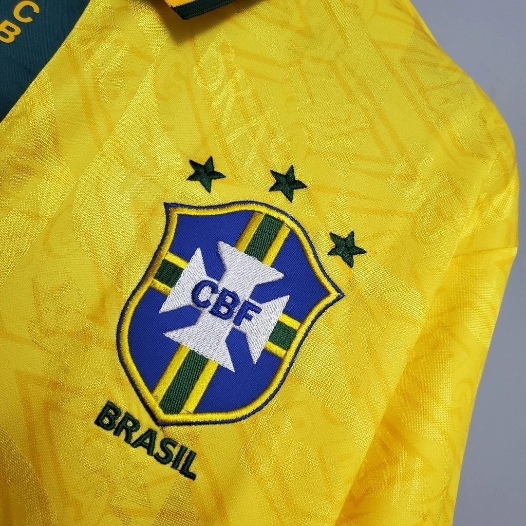 camisa-retro-9193-selecao-brasileira-umbro-masculina-amarela-61-5d9b464c33067f52dc16370074861755-1024-1024-1efb165ee4a712f40616959971711858-1024-1024